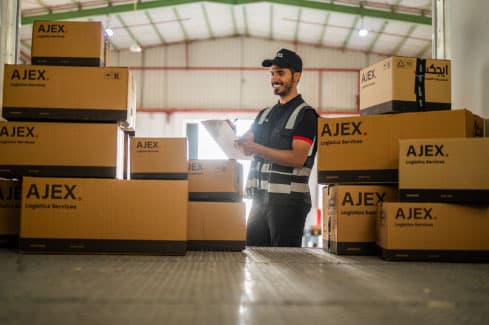 Courier guy checking the shipemnts 